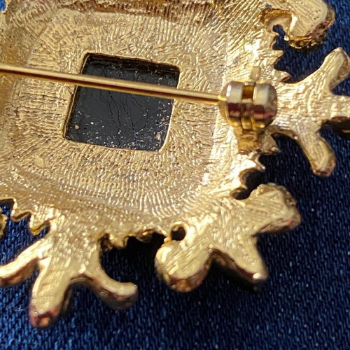 Sphinx brooch collectible gold plated like new with black rhinestones