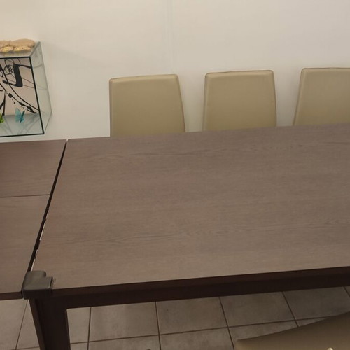 Roche Bobois dining set with 6 beige leather chairs like new