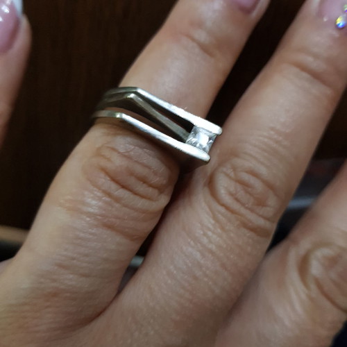 Silver ring with zircon used