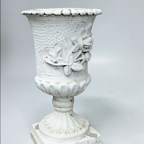 Cement garden urn Roman style used with patina decorative