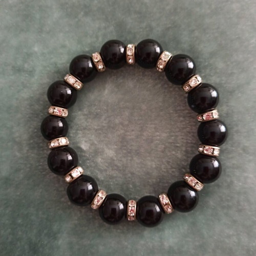 Bracelet with black beads and white crystals like new