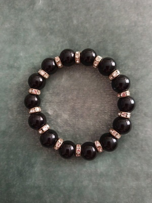 Bracelet with black beads and white crystals like new