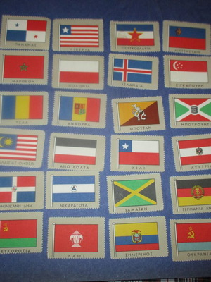 Lot of 36 used country flag stickers, 1960s collection