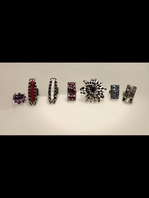 Set of 7 rings used with adjustable clasp
