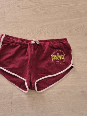 Red pole dancing shorts used, size M