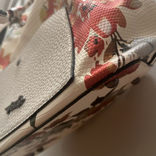 Verde shoulder bag like new, white with multicolor floral design