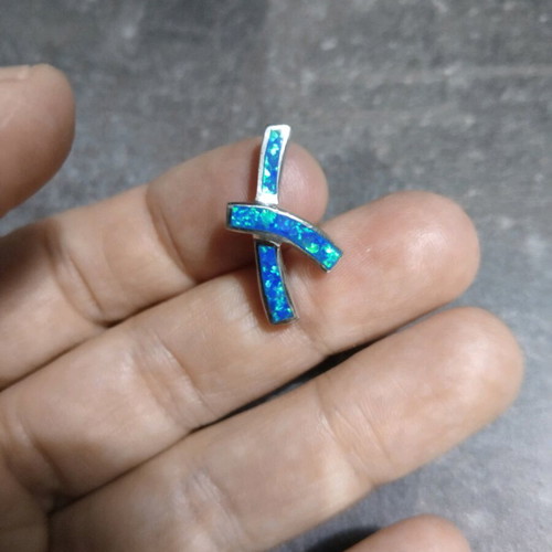 Silver cross with opal like new, modern design