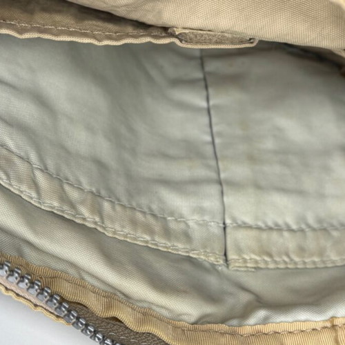 Kipling beige crossbody bag used with multiple compartments and strap