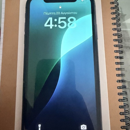 Apple iPhone 11 64GB smartphone with screen damage