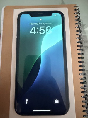 Apple iPhone 11 64GB smartphone with screen damage