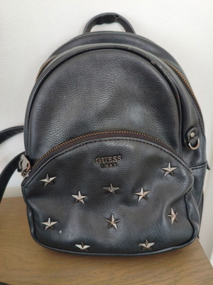 Guess backpack used, black with star details