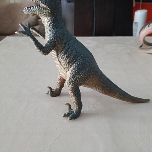 Set of 24 dinosaur figures in various sizes