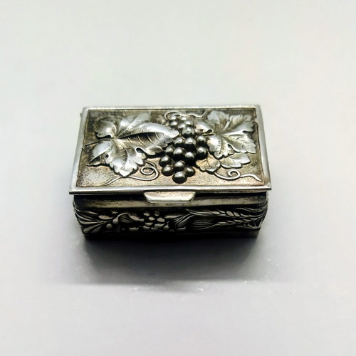 Old silver-plated pill box with embossed decoration like new