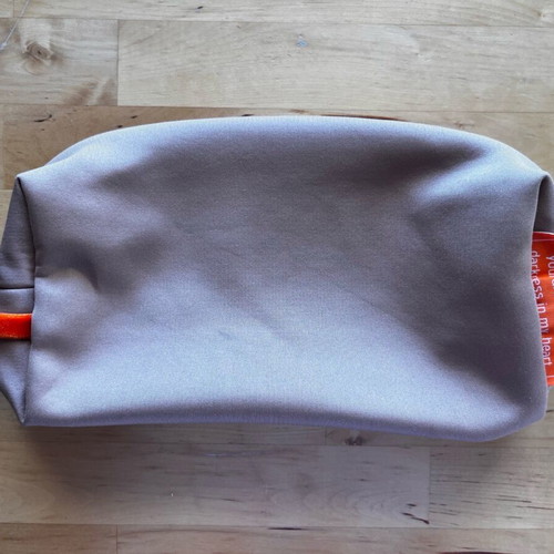 Burgundy soft toiletry bag with zip used