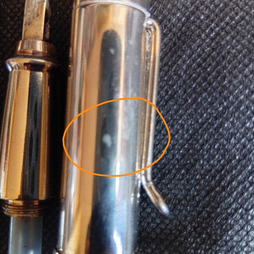 Parafernalia pen used, metal chrome finish, 1980s design