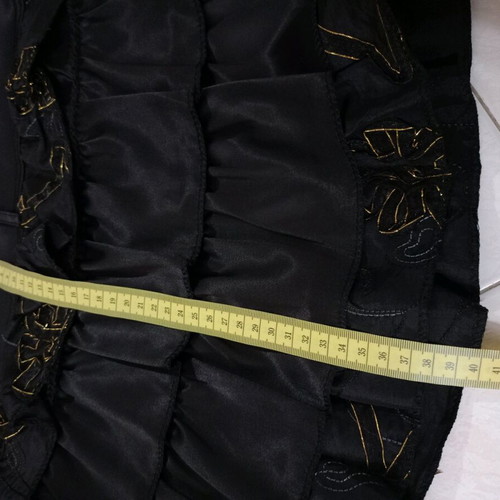Satin mini skirt black like new with layered ruffles and gold details