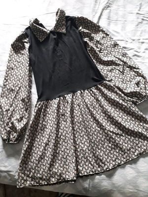 Blouse like new with black elastic fabric and beige, can be worn as dress