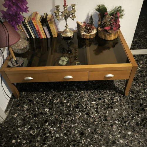 Coffee table used with three drawers and glass top