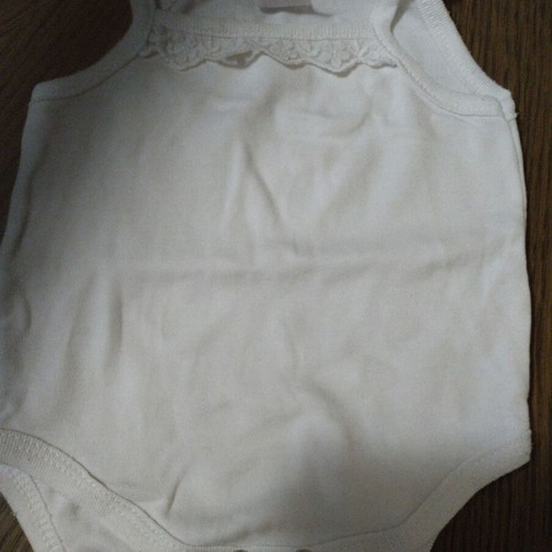 Baby bodysuit used 0-3 months