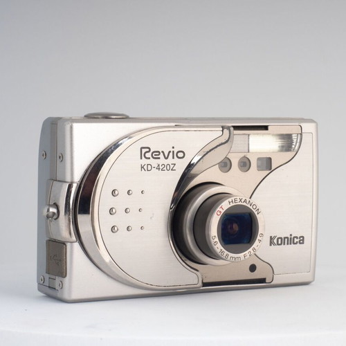 Konica Revio KD-420Z 4MP Digital Camera used with Battery Charger and 2GB SD Card