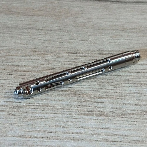 Mini tactical pen with titanium frame like new