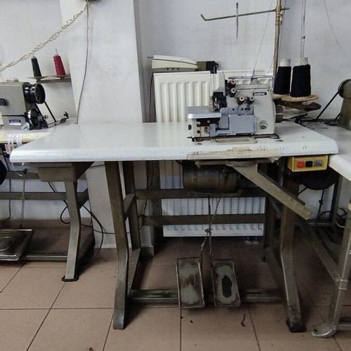 Cutting and Overlock Sewing Machines used, 2 cutting and 2 overlock