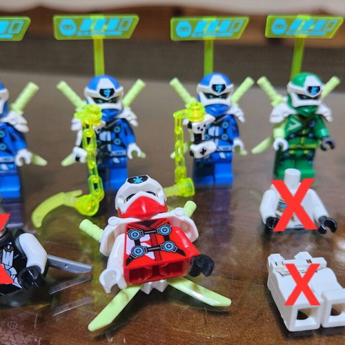 Lego Ninjago figures used with weapons
