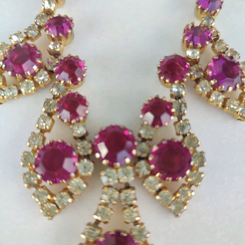 Antique necklace used with pink stones and gold rhinestones