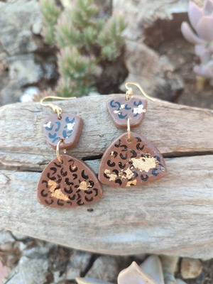 Clay earrings new with painted animal print and gold leaf accents