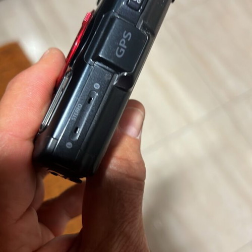 Olympus Tough GPS Camera like new with housing, torch, and base