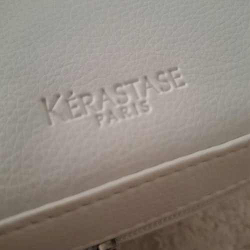 White Kerastase toiletry bag like new with 3 inner pouches