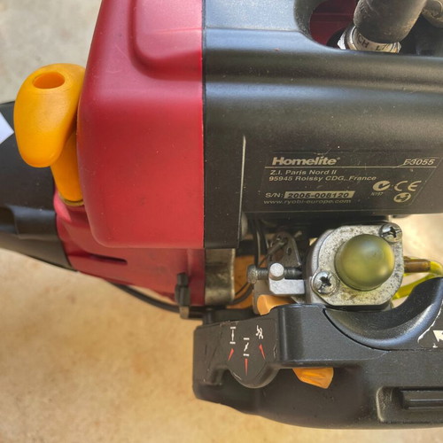 Homelite F3055 Petrol Lawn Mower used with accessories