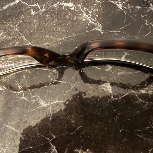 Carrera eyeglass frame used, black with light brown