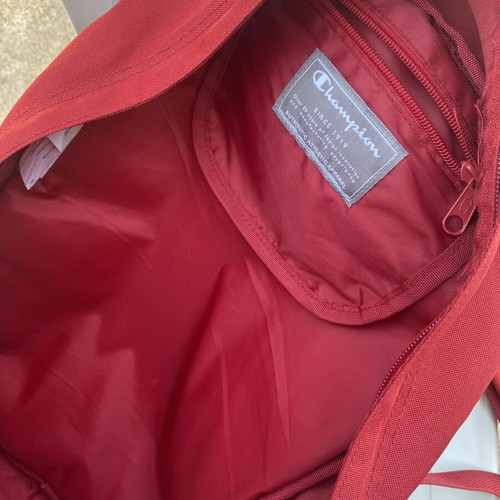 Champion backpack red, like new, large capacity with multiple compartments
