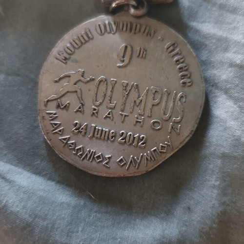 2012 Olympus Marathon finishing medal used