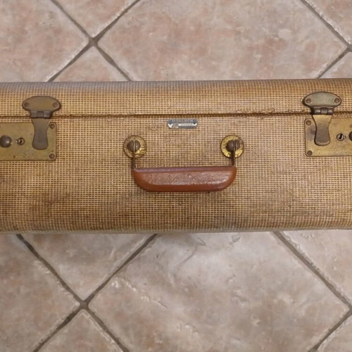 Vintage suitcase from America used with pink satin lining