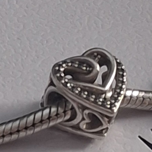 Pandora charm heart with linked hearts decorated with zircon stones, like new
