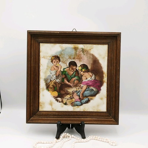 Vintage ceramic picture used with wooden frame