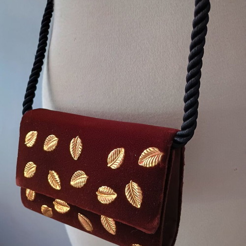 Small brown crossbody bag with gold metallic leaves used