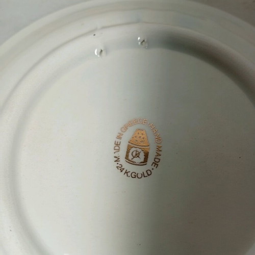 Decorative porcelain or ceramic plate with gold rim like new