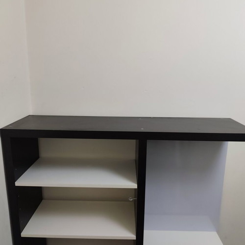 Bookcase used, black color with shelves and drawer