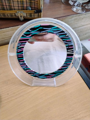 Makeup tabletop mirror with two sides used