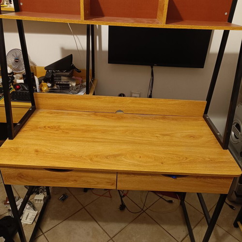Desk with shelf, drawers and footrest storage