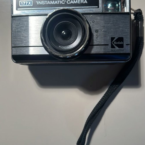 Kodak Instamatic 177X camera used, with Kodar lens and strap