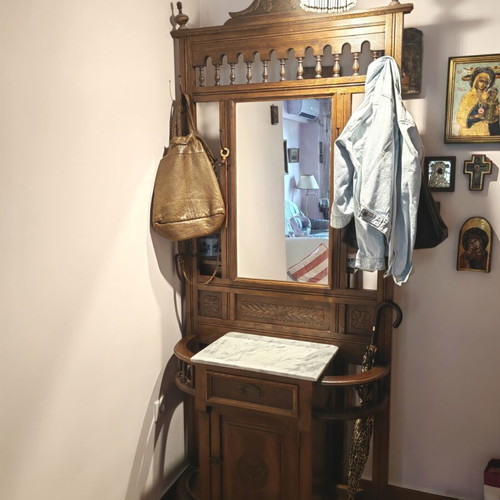 Antique solid walnut entryway furniture with carving, mirror and marble
