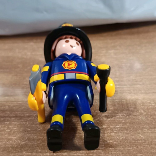 Playmobil Firefighter with Axe and Flashlight like new