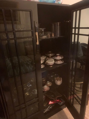 Solid wood showcase used, black lacquer with lighting