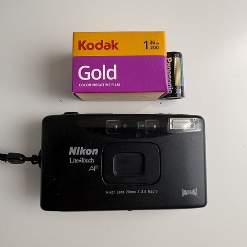 Nikon Lite Touch AF film camera like new with Kodak film and Panasonic battery