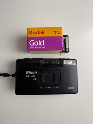 Nikon Lite Touch AF film camera like new with Kodak film and Panasonic battery