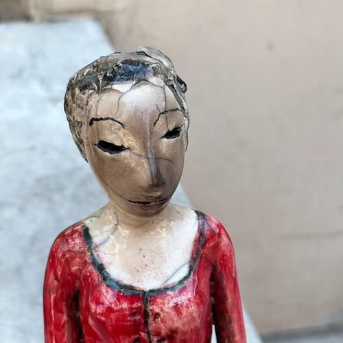 Handmade artistic ceramic woman statue used with rustic style